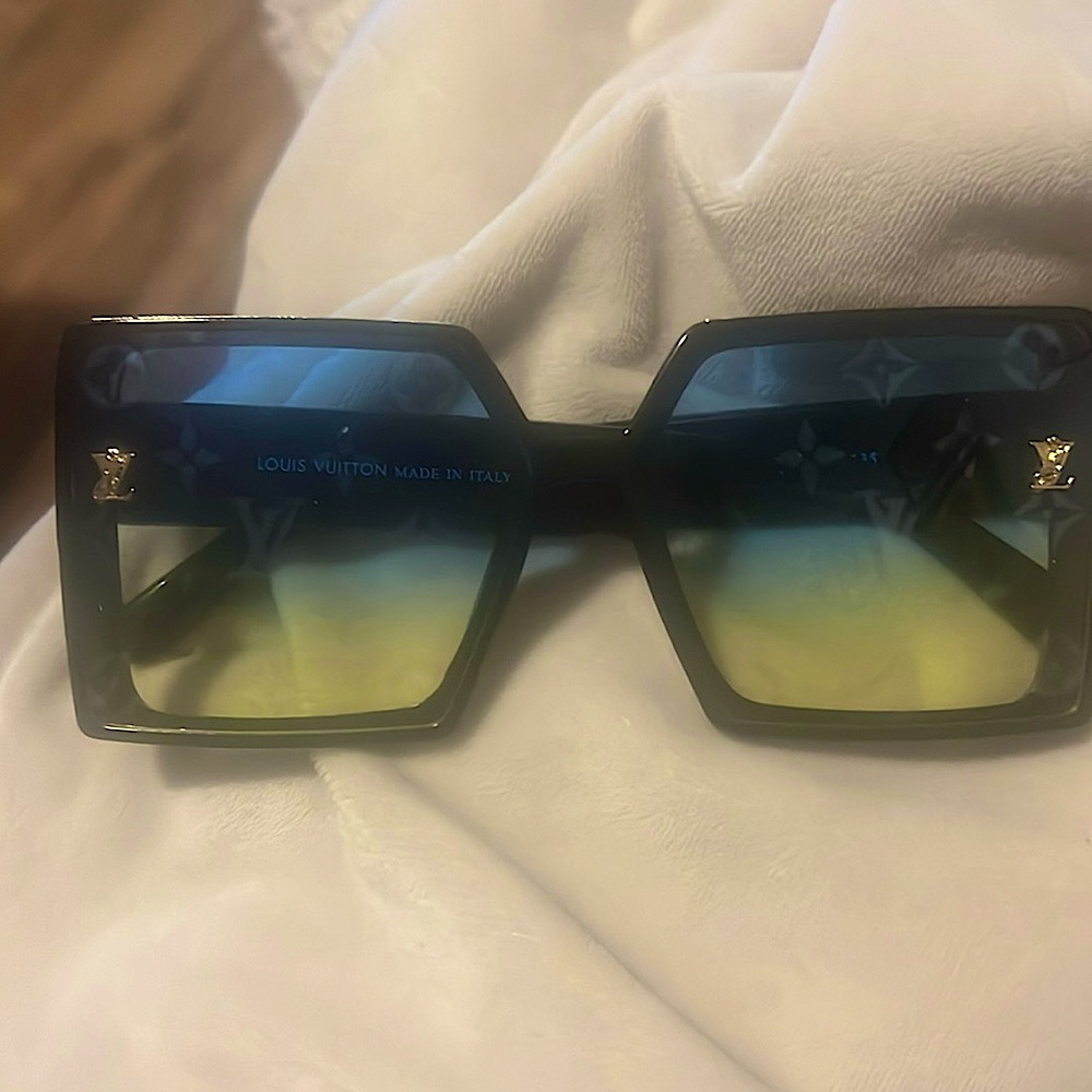 Louis Vittion over seized black sunglasses Monaghan frame with LV
